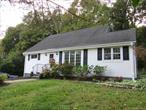 Beautifully updated 2 bedroom Cape Cod home in walking distance to the village of Goshen. This lovely home features a sunny open concept Living Room and renovated Kitchen with hardwood floors and SS appliances. An extra wide hallway leads to 2 nice sized bedrooms and a renovated Bathroom with beautiful tub/shower with marble and porcelum floors. There is also a much sought after Home Office with cathedral ceiling and plenty of natural light. There is a walk up 2nd floor for plenty of storage space. Lush landscaping and block walkways led to a very private rear yard with flagstone patio. Close to shopping, restaurants and parks. Great commuter location>