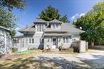 Built in 1897, this historic Colonial home is a unique opportunity for someone with a vision. Boasting 2, 776 square feet of living space, the house features three spacious bedrooms and two full bathrooms, including a luxurious primary bath with a steam shower and jacuzzi tub, and a second with heated flooring. The home is filled with natural light from rain-sensing skylights that automatically close.Situated on a private 0.26-acre lot, the property is set back from the road, offering a quiet and serene environment. The yard is an entertainer&rsquo;s dream, with an sprinkler system and outdoor lighting, as well as multiple storage sheds for convenience. While the home is ready for some cosmetic updates, it has the potential to become a truly gorgeous and comfortable residence.Its prime location in New Rochelle is unparalleled: a short walk to local shops, restaurants, parks, and public transportation for an easy commute. The home is also located near Glen Island Park, providing easy access to its beach, marina, and recreational facilities.