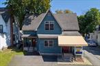 Income-Producing Mixed-Use Opportunity in the Heart of Port Jervis! Welcome to 80 E Main Street, a versatile and spacious 3, 000+ sqft commercial mixed-use property ideally positioned in the heart of the City of Port Jervis. Set on a quarter-acre lot, this well-maintained building offers multiple income streams across three functional unitsâ€”perfect for the entrepreneur, investor, or tradesperson looking to live, work, and earn all in one place. Three Distinct Units â€“ Endless PossibilitiesMain Front Commercial Unit (Lower Level): Formerly a fully outfitted medical office, this space is handicap accessible and includes an elevator for added convenience. The layout includes:A bright reception area and lobby, Two bathrooms, Private exam rooms with built-in sinks and cabinetry, Nurses station, kitchenette, and break room, Over 1, 700 sqft shared between this and the rear commercial unitRear Commercial Unit + Garage (Lower Level): The back office space is currently used by a construction company and pairs seamlessly with the 3-bay garage, built in 2016. Ideal for any trade professionalâ€”plumbers, electricians, landscapers, etc.â€”the garage provides excellent space for equipment storage, vehicles, or workshop needs.Spacious Residential Apartment (Upper Level): Upstairs is a private, sun-filled 3-bedroom, 2-bathroom apartment featuring: 1, 300+ sq ft of living space, High ceilings and fresh paint, A full kitchen with stainless steel appliances: gas range/oven, fridge, microwave, and dishwasher, Separate electric and gas utilities for the apartmentProperty Features & Upgrades: Central air conditioning throughout the entire building, Municipal water and sewer, Natural gas heating, Paved parking lot and driveway, Newer vinyl siding (2005), Private .25-acre lot with excellent street visibility, Prime Location, Just minutes to major highways, 10 minutes to the Port Jervis train station (to NJ and NYC), and 15 minutes to downtown Port Jervis and the Pennsylvania border. Nestled in the Hudson Valley, youâ€™ll be surrounded by scenic beauty, wineries, distilleries, hiking/biking trails, and all that this growing region has to offerâ€”just 90 minutes from New York City. Whether you&rsquo;re expanding your business, investing in a rental opportunity, or looking for a property with flexibility and return, 80 E Main St delivers on every front.