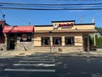 Opportunity knocks with this fully leased two-unit commercial property located at the prominent corner of 58â€“60 Landing Road in Glen Cove. Featuring a 640 sq. ft. pizzeria and a 3, 040 sq. ft. bar and grill, this property offers investors stability, visibility, and long-term growth potential.Both tenants are responsible for their own utilities and property maintenance, minimizing landlord obligations. Ownership responsibilities are limited, making this an attractive low-maintenance asset.Highlights include:Fully leased with established tenantsCentral air and heating in both unitsExpansive 2, 432 sq. ft. basement with walk-in cooler beneath the restaurantPrime corner location with excellent visibility and convenient parking5.6% cap rate at $1, 000, 000 asking priceThis is a turnkey, income-producing investment in a thriving Long Island market. Perfect for those seeking a stable return and long-term value.