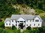 This sophisticated four-bedroom residence offers an ideal blend of convenience and tranquility just north of New York City. Enjoy the ease of walking to the vibrant village of Chappaquaâ€”with its boutiques, caf&#233;s, and train stationâ€”while benefiting from the highly regarded Pleasantville School District. Commuting is effortless with the Chappaqua station mere minutes away and seamless access to the Saw Mill Parkway. An evening on Broadway is just a train ride away, with the serenity of home awaiting your return.The homeâ€™s thoughtful layout begins with a welcoming entry that flows into a beautifully renovated kitchen, where a center island anchors the space. Designed with a nod to California bungalow charm yet updated with modern finishes, it sets the tone for comfortable, stylish living. At the rear of the home, a luminous family room with vaulted ceilings provides an airy, sunlit retreat, ideal for both relaxation and entertaining.Upstairs, four generously proportioned bedrooms offer privacy and comfort. The principal suite, discreetly positioned in its own wing, affords a peaceful escape from the bustle of daily life, while the remaining bedrooms accommodate family or guests with ease. Beyond the interiors, a private, low-maintenance backyard extends the living space outdoors.With its prime location, modern updates, and seamless lifestyle, this residence presents a rare opportunity to step effortlessly into Westchester living. Full bus service to Pleasantville schools further enhances its appeal.