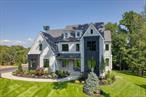 New Construction in Prestigious Sickels Farm Estates â€“ Just 25 Miles from NYC!Now move-in ready, this extraordinary new home in the sought-after Sickels Farm Estates offers the perfect blend of modern elegance and timeless craftsmanship. Set on a beautiful, private acre in a prime cul-de-sac location, this one-of-a-kind Transitional Modern Farmhouse stands out with its sophisticated design and high-end finishes throughout.With 4, 615 square feet of finished living space, including a fully finished walk-out lower level, this custom-built residence features five spacious bedrooms, six full bathrooms, a private study, and a dramatic playroom with soaring cathedral ceilings. From the moment you arrive, the stunning exterior impresses with James Hardie board and batten light gray siding, stone accents, and custom woodwork. A bold iron front door sets the tone for the luxurious interior that follows.Step inside to discover a sun-filled open floor plan with 10-foot ceilings on the main level and 11-foot ceilings in the lower level. The heart of the home is the custom-designed chefâ€™s kitchen, showcasing a gorgeous combination of white and natural wood cabinetry, a massive quartz waterfall island, designer tile backsplash, 48-inch double oven range with pot filler, 42-inch refrigerator, and a spacious dining area surrounded by windows. A large great room with a gas fireplace framed by marble and a custom-built mantel creates an inviting space to relax or entertain, while a wall of glass doors opens to a large back deck overlooking the private, wooded property.White oak flooring runs throughout the home, adding warmth and character. Every bedroom includes its own en-suite bathroom, each thoughtfully designed with curated furniture-style vanities and designer-selected tile, creating luxurious, spa-like retreats for both family and guests. The primary suite features a cathedral ceiling and a serene atmosphere perfect for unwinding after a long day. The show-stopping primary bathroom is a true sanctuary, featuring radiant heated floors, a huge shower with three shower heads, a deep soaking tub, separate water closet, abundant natural light, and a stunning design that blends luxury and comfort. The suite is completed by a sprawling walk-in closet with custom built-in cabinetry, offering both style and function.No detail was overlookedâ€”from the beautifully designed mudroom with shiplap trim and custom wall tree, to the walk-in pantry and oversized coat closet. Even the main-level full bathroom makes a statement, featuring â€œcrocodile skinâ€ wallpaper, black and white diamond tile flooring, Zellige shower tile, and dramatic lighting and vanity selections that elevate the entire space.The finished lower level is a true showstopper, with soaring ceilings, a second family room, a dedicated game room, a light-filled guest suite with a full bath, a private home office, and ample storage space. The spa-inspired lower-level bathroom features marble floor tile and floor-to-ceiling shower tile, creating the feeling of a five-star hotel.Outdoor living is equally impressive with a professionally landscaped acre, a rear patio perfect for entertaining, and a built-in irrigation system for easy maintenance. Enjoy music throughout the home and backyard with a six-zone built-in speaker system. Every inch of this home has been crafted with upscale materials, designer lighting and mirrors, high-end plumbing fixtures, and premium finishes that reflect both luxury and functionality.Built with state-of-the-art energy-efficient systems and superior construction methods, this home delivers not only beauty but peace of mind. Experience refined living in one of the areaâ€™s most coveted neighborhoodsâ€”only 25 miles from NYC.This is truly a rare opportunity to own a spectacular, brand-new home in a prestigious setting. Schedule your private showing today.