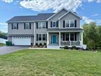 Welcome to the sought-after Stratford Farms development within the Arlington School District. This stunning Essex Model colonial set on .45 acres offers 4 bedrooms, 2.5 baths, a 2-car garage, and 2, 689 sq. ft. of living space, including a partially finished 1, 192 sq. ft. basement. Built in 2018 with seller-added upgrades, the home features a welcoming front porch and entry foyer leading to an open-concept layout with family room/office. living room with cathedral ceilings and oversized dual-level windows, gas fireplace, formal dining room and main level half bath. The modern kitchen is equipped with a large center island, granite countertops with a durable leather finish and stainless-steel appliances (refrigerator, gas stove, microwave, dishwasher). Glass sliding doors off the kitchen walk out to a 16x20 wooden deck. There is convenient access from garage to the kitchen, hardwood floors span the main level and second-floor landing, while bedrooms are carpeted for comfort, with the upstairs landing overlooking the living room; the master suite boasts a walk-in closet with sliding barn door and a spa-like ensuite with double sinks, granite counters, and an oversized shower. The second floor also includes ad additional full bath with tub/shower combo and three spacious bedrooms with ample closet space including a walk-in, second floor dedicated laundry room with utility sink, linen closet and pull-down stairs to an unfinished attic. Upgrades include custom blackout blinds throughout, recessed lighting, central air, an Energy Star Navien hydronic boiler (2018), a main -level oversized deck with stairs to a stone patio, fenced backyard with new retaining wall, 21-ft saltwater above-ground pool, outdoor oasis with privacy and great space for entertaining. House is hardwired for alarm system with full property radius cameras, carbon/smoke detectors. This home has been meticulously maintained to look brand new! The location offers convenient commuter travel only minutes from the Taconic Parkway, Route 44, Metro-North Poughkeepsie Station and bus line, schools, restaurants, shopping, Eastdale Village, Marist and Vassar Colleges, the Culinary Institute, Route 9 shopping, and for natures tranquility, two nearby rail trails and the Walkway Over the Hudson. Start your next chapter in a home that blends comfort, style, and convenienceâ€”reach out today to schedule your showing! Preapproval or Proof of funds required, 24-hour notice preferred. - MOTIVATED SELLER- PRICE REDUCED TO SELL!