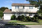 This large Colonial is perfectly located in the gem section of Plainview! It features large updated kitchen with Stainless Steel appliances and an Island. The bedrooms are all oversized. The main floor bedroom is perfect for extended family. The Primary bedroom has lots of closets and a bath with a vanity. The yard is oversized with perfectionally landscaped property. This home is must see!