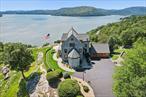 Perched high above the Hudson River, 1 St. Maryâ€™s Conventâ€”also known as St. Josephâ€™s Houseâ€”is a distinguished 5-bedroom, 5.5-bath luxury manor offering nearly 6, 000 sq.ft. of living space on 4.7 private acres.Originally designed by renowned architect Henry Martin Congdon for the first Episcopalian Order in the United States, this remarkable home is rich with history as part of Fort Hill, a strategic lookout once used by George Washington and his troops during the Revolutionary War.Lovingly restored after its 1985 purchase, the residence underwent a multi-year transformation that blends modern comfort with historic detail. Original stonework and chapel woodwork remain intact, while upgrades include modern baths, a chefâ€™s eat-in kitchen, and a dramatic third-floor primary suite complete with spa-like bath, loft, and a private balcony showcasing sweeping Hudson River views.The landscaped grounds are equally impressive, featuring rolling lawns, walking paths, and a heated in-ground pool with panoramic vistas. Additional highlights include a gated entrance, three-car garage with utilities in place for potential expansion, and the rare option for subdivision across the nearly five-acre estate.Perfectly located next to the Abbey Inn & Spa and just one hour from New York City, this home offers an ideal balance of privacy and convenience. Residents can enjoy nearby hiking trails, riverfront parks, and the vibrant arts, dining, and cultural scene of Peekskillâ€™s downtown.A true â€œlegacyâ€ property, 1 St. Maryâ€™s Convent combines unmatched setting, architectural character, and historic significance in one of Westchesterâ€™s most scenic locations.