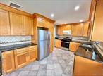 Beautifully Renovated 3 Bedroom Apartment On 1st Floor of Private Home - Located In Yonkers. Walk Right Into Your Bright and Spacious Living Room with Hardwood Floors Throughout. Unwind in a Custom Built Eat-In Kitchen with Granite Countertops and Stainless Steel Appliances. Host Guests in a Formal Dining Room with City Views. 3 Modest Sized Bedrooms with Closets in Each. Apartment Includes: Coin Operated Washer, All Utilities, Central Air, 1 Parking Space & Patio. 1/2 Mile to Shops, Restaurants, Public Transportation & Saw Mill River Parkway.