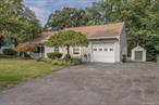 Welcome to this comfortable and airy ranch in a lovely Cornwall neighborhood near town. This sun filled home has a formal dining room and living room, efficient kitchen, and delightful enclosed back porch leading out to the deck, surrounded by a modest and private backyard. Great for entertaining or just experiencing the pretty foliage. Enjoy the convenience of one level living, including a primary bedroom with en-suite bath, an attached garage, additional level driveway parking, central air (2022), generator (2021), town water and sewer, sprinkler system, and natural gas heat. The covered front porch is perfect for morning coffee with the sunrise. This freshly painted 3 bedroom 2 full bathroom home has everything and more. Showings begin Thursday, September 18!