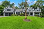 Welcome to a one-of-a-kind, expanded center hall colonial nestled in the desirable Lakeville Estates of East Hills! This stately residence sits on a beautiful, private, close to half-acre of flat property. The impressive main floor features a chef&rsquo;s kitchen with a center island that seamlessly flows into an oversized family room with high ceilings and a wood-burning fireplace. The large living room and dining room with butlerâ€™s pantry, provide an ideal setting for entertaining.Upstairs, find 5 generously sized bedrooms and 3.5 baths. A large addition features a modern home gym and a flexible den/office space, with direct access to an ensuite bedroom. A spacious driveway and oversized two-car garage open to a mudroom, and a large laundry room. Enjoy a premier mid-block location, convenient to shopping, schools, restaurants, train and highways. Located in the desirable Roslyn School District and includes membership to the East Hills Park and Pool.