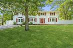 This center hall colonial in the Mount Sinai school district has it all. Approx 3000 sq ft, fully updated and move-in ready, featuring a possible legal accessory unit (with proper permits). The mother/daughter unit is spacious and features 2 stories with a second full kitchen, a living room/dining room combo and an oversized bedroom/living room combo on the second level complete with new full bathroom. The main portion of the home boasts 4 more bedrooms and 2.5 baths with a primary ensuite and walk-in closet. Enjoy an open kitchen/dining room concept with a center island, custom cabinetry, quartz counter tops, farm sink, pot filler and stainless steel appliances with gas cooking. Laundry area (with separate entrance) and new washer and dryer, plus a new reverse osmosis water filtration system for the entire home including drinking water and showers. Ample space to entertain guests with separate sitting room, plus a sunken living room with gas fireplace and sliding doors leading to the patio and large backyard with newer PVC fence, fire pit and shed. 4 zone IG sprinklers. Basement provides tons of storage and includes a second refrigerator/freezer. Newer roof and all new windows, plus updated electric. Situated on .34 acres in a picturesque neighborhood. This is one you don&rsquo;t want to miss.
