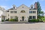 Welcome to 2 Belmont, an impeccably maintained modern colonial set on over an acre of beautifully landscaped grounds in sought-after Ardsley Park. Overlooking the rolling greens of the Ardsley Country Club, this home offers over 6, 000 square feet of flexible living space and lives like a 5â€“6 bedroom with an abundance of bonus areas.The heart of the home is the renovated kitchen, seamlessly opening to a sunlit family room with custom built-ins. A formal living room with a cozy fireplace creates the perfect setting for gatherings, while a private home office with sweeping golf course views makes working from home a dream. Upstairs, the serene primary suite features a beautifully renovated bath while down the hall you will find three additional bedrooms, two full bathrooms, and a spacious second-floor laundry room with generous storage.A versatile second-floor bonus room offers endless possibilities - easily reimagined as a guest suite with space for a bathroom or summer kitchen. The walk-out lower level provides almost 2, 000 square feet of recreation space including a gym and wine cellar. Additional highlights include a newly designed mudroom with a sleek powder room featuring a Kast sink and direct access to the heated garage.Set on a private drive and less than a mile to the train and the Old Croton Aqueduct trail, this home is minutes from both Irvington and Dobbs Ferry villages. Located within the choice of Irvington or Dobbs Ferry school districts, 2 Belmont combines elegance, comfort, and convenience in one exceptional property.