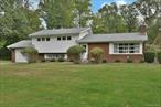 Welcome to this spacious 3-bedroom, 2 bath split-level home, set on a level, nearly half-acre corner lot in the highly sought-after Clarkstown School District.The main level offers a warm and inviting living room with a gas fireplace and custom built-in shelving. A step-up dining area overlooks the living room and flows seamlessly into the kitchen, which has direct access to the rear yardâ€”perfect for entertaining or everyday convenience. Upstairs, the primary suite features a renovated full bath with shower. Two additional bedrooms and another full bath complete this level. The lower level provides a versatile family room, a bonus rm for guests/home office and a laundry area. An unfinished basement offers plenty of storage and endless possibilities. Additional highlights include a Generac generator, ensuring peace of mind, and a prime location close to major highways -PIP and NYS Thruway and vibrant New City, with its wide variety of shopping, dining, and recreational amenities. Only 35 minutes to NYC! Combining space, updates, and a sought-after location, this home is a perfect choice for todayâ€™s lifestyle.