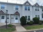 Enjoy easy living in this centrally located, spacious, 3 bedroom 2.5 bath condo. Newer tiled floors on 1st floor, newer bathroom vanities, sinks, lighting, hot water heater. Washer/dryer in unit. Primary bedroom ensuite with large walk-in closet, private bathroom. Sliders to patio from dining room, plenty of closets for storage. Close to highways, shopping, schools + two parking spots right in front of unit.