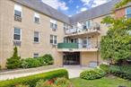 Rarely Available 1-Bedroom Corner Condo in the Highly Desired Greentree Complex!This move-in ready 2nd-floor unit features an open-style kitchen with granite countertops, a custom-designed island for dining, and stainless steel appliances (gas stove, microwave, refrigerator, and Bosch dishwasher). The spacious living room with dining area includes hardwood flooring, while the main bedroom offers access to a private balcony. Additional highlights include two built-in AC units and assigned garage parking.Residents enjoy a full suite of amenities in this elevator building, including a newly renovated gunite pool, modern lobby, new boilers, updated laundry and storage rooms, bike rack, meeting room, and a live-in super.Conveniently located near the LIRR, shopping, and schools, this condo offers low taxes and low common chargesâ€”which include heat and parkingâ€”providing exceptional value.Why rent when you can own?