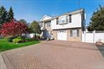 This great opportunity is what you been waiting for! Oversized Hi-Ranch in the heart of Lindenhurst. This modern home with 5 bedrooms and 3 bathroom. Great opportunity for a big family looking for a perfect home. Beautiful kitchen with quartz countertops and electric stainless steel appliances which includes electric range, refrigerator, dishwasher and a microwave. Large living room. with a vaulted ceiling and skylight. Hardwood throughout. Great for a extended family, Mother and Daughter with proper permits with three outside entrances. Full fenced in yard, Updated electrical, gas heating. Close to shopping areas, restaurants, train. Close to parks, beaches and schools. Overall this is a great neighborhood. Don&rsquo;t. miss this opportunity to own this great home for a big family or investment opportunity.