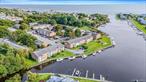 Pet-friendly waterfront co-op with direct water access! This 1 bedroom, 1 bathroom unit features hardwood floors and is located inside a secure gated community. Enjoy the boating lifestyle without the hassle and million dollar price tag - no bulkhead or waterfront maintenance to worry about. Minutes from local shops, restaurants, and parks with Fire Island just a 15-minute boat ride away. The community offers a resort-like feel, complete with dedicated parking and stress-free, low-maintenance lifestyle. An incredible opportunity to live on the water at an unbelievably affordable price!