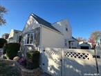 SOUTH -Flower Garden,  vegetable garden in Back Yard. Central A/C plus 4 ductless Split Unit A/C. . Brand New 2021 GAS BOILER , 2022 NEW GE WASHER & DRYER , roof about 2012. OPEN KITCHEN WITH DISHWASHER , FAMILY ROOM WITH SLIDING DOOR TO BACKYARD . Bus Q16 /76, Qm 20, Q31. Low Property Tax with exception .5 BEDROOMS 2 Full bath . 1 CAR GARAGE , long DRIVEWAY . Building size 26x38 . Lot size 41.42x100 ., Additional information: Appearance:VERY GOOD, Interior Features:Guest Quarters, Lr/Dr