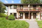Welcome to Jefferson Village, a highly desirable 55+ community! This rare FIRST FLOOR, NO STEPS end unit located on a cul-de-sac offers ease of living with an assigned parking space (2A) right outside your door. Filled with natural light, this condo offers a large living room and dining room area, a spacious primary bedroom with ample closet space with two large bedroom closets and two hall closets. Featured upgrades include white kitchen cabinetry, 2020 air conditioning system, new in-unit washer/dryer, updated full bath with a double wide, walk-in shower and a waterfall sink faucet with a granite countertop.Jefferson Village residents enjoy a vibrant lifestyle with access to a clubhouse hosting year-round social events, a large outdoor pool, tennis and pickleball courts, fitness center, billiards room, community garden, and more. Perfectly situated near the Jefferson Valley Mall, shops, restaurants, medical offices, public transportation and the Taconic State Parkway, this move-in-ready home offers comfort, convenience, and community. Many scheduled events and clubs available for residents to enjoy. You will absolutely love this lifestyle with so much to offer.