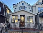 Welcome to this well-maintained single-family home in the heart of South Richmond Hill, conveniently located across from 101 Avenue on 115th Street. This spacious residence features a bright living room, and an updated kitchen with ample cabinet space. Upstairs offers comfortable bedrooms and a full bath. The finished basement with outside entrance provides additional living or recreational space, perfect for extended family or guests. Private backyard, great for entertaining. Close to schools, shops, transportation, and houses of worship. A wonderful opportunity to own a home in a prime location!