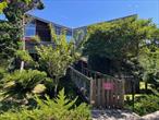 One of a kind, triple mint, designer 1 bedroom co-op. Garden facing, sunny, extra large terrace with retractable awning. Steps from both Harbor & beach.