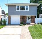 Welcome to 2463 Rockville Centre Pkwy- A Stunning, Sun Drenched Hi-Ranch In The Heart of Oceanside, Terrace Area, This Beautifully Renovated 4-Bedroom, 2-Full Bath Hi-Ranch Boasts Formal Living Room, Formal Dining Room, Gorgeous Newly Renovated EIK Kitchen with Quartz Countertops and Stainless Steel Appliances. The Versatile Lower Level Offers a Large Bedroom, Full Bath and Large Bright Den/Family Room W/Access to Beautiful Yard w/rear patio, Great Place to Relax and Unwind. This Home Offers Plenty of Storage in the One Car Garage, CAC, , Water Filtration System, Beautiful Wood Floors Throughout Conveniently Located Near Public Transportation, Shopping, Schools & LIRR for an easy NYC commute. Perfect for Large Family or Multigenerational Living. Don&rsquo;t Miss This Opportunity To Make This Beautiful House Your Home!!