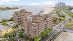 Discover modern coastal living in this bright and spacious 2-bedroom, 2-bathroom residence just steps from Far Rockaway Beach. Featuring an open-concept layout, the living, dining, and kitchen areas flow seamlessly together, creating the perfect setting for both relaxing and entertaining.Enjoy a private porch with easy access to the shoreline. Both bedrooms are generously sized, with the primary suite offering its own full bathroom for added privacy and convenience. The second bathroom is thoughtfully designed with modern finishes, making this home as functional as it is stylish.