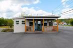 Fantastic corner unit on high-traffic East Broadway in the Village of Monticello. This 692 sq. ft. space includes a reception area, large office, kitchen, and conference room. The property sits on a full acre with excellent visibility on two roads and plenty of parking for staff and customers. Additional features include the option to rent outdoor storage and the ability to combine this unit with two neighboring units (MLS# 906826, 906834), offering even more space and flexibility to fit your business needs. Located near many local businesses and one of the busiest intersections in town, this is a prime opportunity for anyone with an eye for growth.