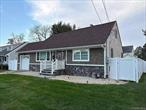 Welcome to 16 Smith Street, Hicksville! This fully renovated home offers modern living and is ready for immediate move-in. Featuring 3 bedrooms and 2 bathrooms, it includes spacious living and dining rooms and a large, contemporary kitchen with stainless steel appliances, sleek countertops, and a center island. The first floor provides a welcoming living room, dining area, full bathroom, and a convenient first-floor bedroom. Upstairs are two additional bedrooms and a second full bath.The full finished basement adds excellent versatility with generous storage closets and a laundry room. Additional highlights include gas heat, central air conditioning, and brand-new electric service with a 150-amp panel. An attached garage, a 6, 000-square-foot fully fenced lot, and a sprinkler system complete the property.