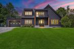 Welcome to 346 Mullock Road â€“ A Private Pondside Mini-Estate in the Heart of the Hudson ValleyTucked away down a long, tree-lined drive in the sought after Minisink Valley School District, this 3-bedroom, 3-bathroom contemporary sanctuary unfolds across 3300+ sqft of architecturally distinctive living space, set on 5.4 private, park-like acres with not one, but two spring-fed ponds teeming with bass, perch, catfish, and sunfish. The back pond is a hidden treasureâ€”clay-lined and 15 feet deep with its own dock and sitting area, perfect for swimming, fishing, or ice-skating in the winter months.As you approach, the serenity begins. A teardrop circle driveway welcomes you to the oversized 2-car garage, with ample parking for guests. Step onto the covered front porch, and through the front door into a home that feels like both a modern gallery and a warm embrace. The foyer opens dramatically to the second story, sunlight pouring through towering windows, and tucked under the stairsâ€”a thoughtfully designed doggy bedroom, because even your pup deserves a slice of luxury.The main level offers open-concept living with granite flooring, a cozy gas stone fireplace, and a seamless flow from the living space to a chef-inspired kitchen. Outfitted with state-of-the-art stainless appliances, granite countertops, a 6-burner gas/electric range, oversized refrigerator, and breathtaking views from the massive sliding doorsâ€”this kitchen is more than functional; itâ€™s a place to gather, to cook, to live. A spacious guest bedroom and updated full bath complete the main floor, alongside a private laundry room.Ascend to the second floor and experience a level of detail that makes this home truly special. Rich hardwood floors run throughout, creating a warm and inviting tone. At the top of the stairs, youâ€™ll find a large sitting area or reading nook, with massive sliding glass doors that lead to a rear-facing balconyâ€”the ideal spot to sip coffee and soak in the peaceful views of the pond, clubhouse, and woodlands.The primary bedroom features dual closets, a private balcony, and overlooks the living room from a charming interior Juliet perch. The second upstairs bedroom boasts a massive deck and an ensuite bathroom. An additional den, library, or home office, a front-facing balcony, and another full bath completes the levelâ€”ideal for remote work or peaceful study.But the magic doesnâ€™t end inside.Wander through the backyard past lush grass, mature trees, and garden spaces. The gentle slope also lends to great sleigh riding. Grill over a custom-built Santa Maria-style BBQ, roast marshmallows around the stone fire pit, play a game of horseshoes with friends, and eventually arrive at the most delightful surpriseâ€”â€œThe Clubhouse.â€ This two-story retreat has a true vibe, offering a cozy, rustic-chic hangout space for unforgettable gatherings, late-night laughter, or even artistic escape. Itâ€™s like having your own private campground, right at home.This property was engineered with intention and durabilityâ€”built with steel I-beams, 2x6 framing, and a concrete roof layered with foam insulation and EPDM for ultimate efficiency. Situated just 15 minutes to major highways and the train to NYC, and under 90 minutes to Manhattan, and only 10 minutes from NJ and PA borders, this rare gem offers complete privacy while staying connected to everything the Hudson Valley has to offer: hiking, biking, the Delaware River, wineries and distilleries, apple orchards, seasonal views local attractions (LEGOLAND) and charming river towns. This isnâ€™t just a houseâ€”itâ€™s a retreat for the soul and a home youâ€™ll never need a vacation from. A place where every pond ripple, every breeze through the trees, every thoughtful design choice whispers the same thing:You belong here.