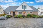 Opportunity Awaits at 246 Blacksmith Road in Levittown!Bring your vision and creativity to this spacious Cape Cod-style home offering over 2, 200 sq ft of living space, 5 bedrooms, 2 full bathrooms, with plenty of storage and closet space.Built in 1951 and sitting on a 6, 000 sq ft lot, this property has the bones and layout for a dream home...just waiting for your personal touches. Features include a cozy fireplace in the family room off of the kitchen. Multiple bedrooms across two levels provides much flexibility in living arrangements.The backyard space offers opportunities for outdoor entertaining and gardening. This prime location in the heart of Levittown is in close walking distance to schools, parks, pools, and nearby shopping, dining, and major highways makes this the location a true dream.Take advantage of this fantastic chance to customize a home to your own personal taste.