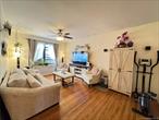 Welcome to this oversized and sun-drenched 1-bedroom condo in the highly desirable Garden Bay Condominiums of Astoria Heights, Queens. Situated on the top floor of a charming pre-war building, this rare corner unit offers approximately 900 square ft of thoughtfully laid-out living space with great flow and timeless character.An open foyer welcomes you into the home, leading to a large, light-filled living room and a spacious formal dining areaâ€”perfect for entertaining or creating a stylish home office setup. The layout flows seamlessly from room to room, creating a bright, airy atmosphere throughout.Original hardwood floors, high ceilings, and multiple exposures bring warmth and charm to every corner. The king-sized bedroom offers peace and privacy, while the generous proportions of each room provide flexibility and comfort not often found in a one-bedroom home.Nestled in a well-maintained, beautifully landscaped complex, this top-floor unit combines classic details with modern livabilityâ€”just minutes from Astoriaâ€™s vibrant dining scene, parks, and easy access to Manhattan.This is a rare opportunity to own a spacious, top-floor residence in one of Queensâ€™ most coveted communities.