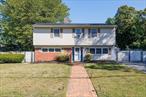 Located in the desirable Village of Babylon, this beautifully maintained 4-bedroom, 2 bath Splanch sits on the edge of scenic Southards Pond, offering peace, and privacy. The home features a unique multi-level layout with a sun-filled formal living room, cozy den, and a large eat-in kitchen - for both everyday living and entertaining. All four bedrooms are generously sized, providing ample space for comfort and flexibility. The home also includes a detached garage, upgraded plumbing and electric and plenty of storage throughout. Step outside to enjoy a private backyard with direct access to nature trails, the serene pond, and picturesque views. Convenient to Village shops, restaurants, schools, and the LIRR. A great opportunity to own a spacious home in a Babylon Village location!