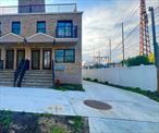 2 family brand new brick in the heart of Woodside