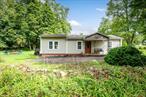 Opportunity awaits with this 1-bedroom, 1-bath home set on a flat, buildable corner lot of approximately one acre. The property is located on a quiet block in a desirable neighborhood and offers potential for expansion or new construction. Enjoy the benefit of being in a well-regarded school district, close to a local golf course, and just 1â€“2 miles from the Taconic Parkway for easy commuting. This setting combines convenience with a peaceful residential feel, making it an attractive option for buyers looking to build or renovate in a sought-after location.