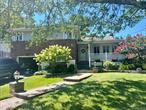 This beautifully split-level home, situated in a quiet cul-de-sac, boasts tremendous curb appeal, features 4 bedrooms and 3 bathrooms, Main level includes a foyer, a warm and inviting atmosphere throughout its spacious bright sunny living room with cathedral ceiling and a skylight, a formal dining room, an eat-in kitchen with stainless steel refrigerator and granite counters, Upstairs, the second-floor primary bedroom with ensuite full bathroom with comfort height toilet and shower, a door to the deck that overlooks a serene manicured backyard. Additional two bedrooms and full bathroom.Lower level walk into family room with wood burning fireplace, built in bookcase and sliding doors leading to the backyard patio.Basement spacious with many possibilities for entertainment/storage and more.Gas heating/cooking, new central A/C , separate hot water heater, in ground sprinklers.Donâ€™t miss the chance to make this charming home your own! Come and start making your own memories in this beautiful home