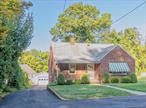 Nestled in one of Uptown Kingston&rsquo;s most desirable walkable neighborhoods, this classic brick Cape offers both character and convenience. Just steps from vibrant restaurants, caf&#233;s, shops, the farmers market, and year-round festivals, you will enjoy the best of city living with a small-town feel.The home features 3/4 bedrooms and 2 full baths with a versatile layout. The main level offers a bright living room, an eat-in kitchen, a bedroom, a full bath, plus an additional room perfect as a home office, den, or 4th bedroom. Upstairs, you will find two spacious bedrooms, a second full bath, and a walk-in attic providing excellent storage. The full basement offers laundry, walk-out access to the backyard, and exciting finishing possibilities. Outside, enjoy a deep backyard with space to garden, relax, or entertain, along with a detached garage.Additional highlights include easy access to the bus station, nearby schools, and just minutes to NYS Thruway Exit 19â€”making commuting and weekend getaways a breeze. This Kingston gem combines charm, functionality, and an unbeatable locationâ€”ready to welcome its next owners.