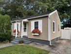 Cute 2 Bedroom Cottage with Low Taxes under $4, 200.00. Sachem School District, Newer Heating and CAC System, Part basement, Updated EIK with Granite and SS Appliances, Close to all major Highways, Minutes to LIRR and MacArthur Airport. Vinyl Fenced in Yard. Deck off back of the house. Shed in backyard.