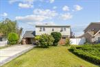 Expanded Four Bedroom Two Bath Cape Cod Style With Some Updates. New Primary Bath, 2021 Expanded Driveway.