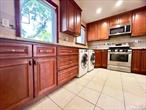 Experience the ultimate in urban living in this stunning 2nd-floor Garden VIEW CO-OP apartment, boasting 2 spacious bedrooms and breathtaking garden views. To ensure a harmonious community, owner-occupants are required to have a credit score of 700+, a 10% down payment, and a debt-to-income ratio of 30%. Cats are welcome, and while dogs and subletting are not permitted, a 5% flip tax is payable by the seller. Ideally located near public transportation, including bus Q88 to Queens Center and express buses QM5/8/35 to NYC, with shopping centers within walking distance on Bell Blvd & 73 Ave. As part of school district #26, residents have access to top-rated schools, including PS46, MS 74, and Cardozo HS. The maintenance fee covers all expenses except electricity, providing a worry-free living experience. WASHER & DRYER AND 3 SPLIT WALL AC unit has been installed .