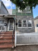 Presenting 95-09 88th Street, Ozone Park, NY 11416 â€“ A classic two-family residence offering incredible potential for both investors and end-users seeking to create a customized home in the vibrant Ozone Park neighborhood. This property features a versatile layout: the first floor houses a spacious two-bedroom, one-bathroom apartment, while the second floor offers a generous three-bedroom, one-bathroom apartment. Both units are primed for full renovation, providing an excellent opportunity to design and upgrade to modern standards. The home also features a finished basement with a bathroom and a dedicated laundry roomâ€”ideal for additional recreational space or storage. Step outside to the backyard, which features a private patio, perfect for entertaining, gardening, or simply relaxing in your own outdoor retreat. Inside, large windows fill the rooms with natural light, creating an open and airy atmosphere. Whether you&rsquo;re considering owner-occupancy with rental income or a multi-generational living arrangement, the floor plan allows for optimal separation and privacy. The property is a blank canvas, ready for your vision to turn it into a stylish and functional space tailored to your needs. Located just minutes from the A & J trains and multiple bus routes, commuting across Brooklyn, Manhattan, and to JFK is quick and easy. Nearby Liberty Avenue and 101st Avenue provide a wide variety of shopping, dining, and everyday services, making this property as convenient as it is promising. Situated on a peaceful, tree-lined residential block, this home offers value, flexibility, and unmatched convenience. This is the perfect opportunity for your next project. Come see the potential for yourself!