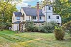 This unique Tudor-style Colonial blends classic European charm with modern comfort. Nestled in the highly sought-after Laurel Plains Elementary area within the Clarkstown School District .Featuring rounded doorways, wide plank wood floors in the living room and dining room area with magnificent wood-beamed ceiling in the living room. A grand fireplace anchors the main level, while a second fireplace upstairs adds cozy appeal. This home features an abundance of exposed stone throughout the interior, offering a ageless blend of rustic charm .The kitchen boasts wood ceilings with recessed lighting with 2 skylights providing endless sunshine in an open floor plan, a triple slider with transom windows, and opens to a double-tiered deckâ€”complete with a hot tub on the lower level for year-round relaxation. Retreat to the spa-inspired primary suite, where youâ€™ll find a heated bathroom floor jetted whirlpool , double sink , skylights and separate shower. With architectural details rarely found elsewhere, this one-of-a-kind home offers function, style , comfort an abundant natural light, and an unbeatable location. This rustic home is filled with charm, warmth, character and is totally timeless. This property is a true haven, combining privacy, luxury, and functionality. Experience it for yourself and see why life at 51 Laurel could be perfect for you. WELCOME HOME!!!!