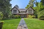 A Timeless Tudor, Beautifully Reimagined for Modern LivingSet on a sweeping front lawn in the heart of Scarsdaleâ€™s coveted Greenacres neighborhood, this beautifully renovated Tudor blends the charm of a classic residence with the comfort and sophistication of todayâ€™s lifestyle. Perfectly situated within walking distance to the train, shops, restaurants, and award-winning Scarsdale schools, the home offers both elegance and convenience. Owned by the same family for over 37 years, this is a rare offering that awaits a lucky buyer!A gracious formal entrance hall introduces the classic center hall layout and showcases the home&rsquo;s high ceilings, sun-filled interiors, grand scale and generously-sized formal and informal living spaces. The expansive living room, anchored by a beautiful fireplace, accommodates multiple seating areas and features French doors that lead to an airy and bright den/family room. Located off the center hall, the dramatic dining room features the perfect proportion for refined and elegant entertaining with direct access to the chic and modern chefâ€™s kitchen detailed with white marble countertops, an oversized center island with seating, stainless steel appliances, and a breakfast area overlooking the picturesque and landscaped backyard. The eat-in kitchen is both functional and inviting and large enough to accommodate friends and family for informal social gatherings and offers easy access to a large deck and the back yard for seamless indoor-outdoor living and entertaining. A stylish powder room completes the main level.Upstairs, the spectacular primary suite offers a private retreat that is luxuriously spacious with its own sitting area, walk-in closet, and a renovated ensuite bathroom. Near the primary bedroom is a large family bedroom which can serve as a primary sitting room/office. 4 additional bedrooms and three additional full bathrooms provide spacious and comfortable accommodations and complete this stylish 6 Bedroom/ 4 full bath Greenacres Tudor. A large basement with adequate ceiling height offers ample room for a playroom, gym, media room, laundry and storage and features a two car attached garage.Move-in ready, and upgraded with a 2 zone air conditioning system and modern kitchen and bathrooms, this residence presents the very rare opportunity to enjoy the enduring character of a substantial old world Tudor with modern amenities within one of Scarsdaleâ€™s most sought-after neighborhoods and the amazing convenience of VERY CLOSE PROXIMITY to the train station, Scarsdale schools, recreation, local shops and restaurants. Don&rsquo;t miss this one! This rare treasure won&rsquo;t last long on the market!. Offering the best of living in Scarsdale -- all within a quick 35-minute express train ride to Grand Central and NYC!