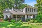 Located in Dover Plains, this charming 3-bedroom, 2-bath Colonial offers 2, 230 sq. ft. of living space on a 1.27-acre corner lot and includes a detached 2-car garage. Inside, youâ€™ll find an inviting open-concept layout. The main level is perfect for entertaining or everyday living and features a spacious living room with hardwood floors, a large dining room that flows seamlessly to an eat-in kitchen with an oversized granite island, ample counter space, a double oven, and a copper farmhouse sink. Just off the kitchen, a cozy family room features a wood-burning stove and a sliding glass door that opens to the patio, hot tub, and level backyard. Also on the main level is a fully renovated bath with a soaking tub, vessel sink, and a convenient laundry area. Upstairs, the primary bedroom provides plenty of natural light and space to unwind. The second bedroom features a walk-in closet and access to a second-story deck and connects to the third bedroom, which is filled with natural light from the greenhouse windows and provides beautiful views. The upstairs bath offers a standing shower, Jacuzzi tub, dual sinks, and a walk-in linen closet. With its spacious layout, updates, and scenic setting, this home is ready to welcome its next owner. Donâ€™t miss out on this opportunity!