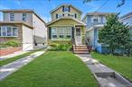 Prime Flushing detached Colonial w 3 bedrooms, eat in Kitchen, Hardwood floors throughout, shared driveway w private spot, carport and detached 1.5 car garage. Custom woodwork throughout. Spacious full basement w Outside separate entrance and Laundry, R4 Zoned! Hurry this gorgeous home will not last!
