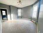 Check out this newly renovated oversized first-floor apartment featuring three spacious bedrooms, a modern full bath, and abundant natural light throughout. Highlights include a a spacious living room, a large eat-in kitchen with a walk in pantry, and a dining room off the kitchen. Conveniently located and move-in ready. Tenant responsible for gas and electric. PROGRAMS ACCEPTED. We are an Equal Housing Opportunity provider and welcome all applicants.