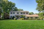 Set in the heart of the Incorporated Village of Plandome, this property offers a rare opportunity in one of the communityâ€™s most premier locations.This 3, 432 sq ft Colonial sits on over half an acre (140x230) of flat landscaped grounds and includes village approved plans for renovation and extension, a major value add for the next owner.The home currently features 5 bedrooms including a main floor maidâ€™s room, 5 baths with a primary ensuite, and a functional floor plan that balances comfort with charm. Skylights, central air, gas heat, central vac, sprinklers, security system, and double closets throughout provide everyday convenience.The backyard is a private retreat with a 20x40 inground gunite pool, hot tub, cabana, shed, and brick patio surrounded by lush landscaping, perfect for summer entertaining. Inside, a gracious entry with skylight and a sweeping two tier staircase leads to the living room with wood burning fireplace, a formal dining room, and a sunlit family room overlooking the grounds. The eat in kitchen with stainless steel appliances, powder room, and maidâ€™s suite complete the main level.Additional highlights include a two car attached garage with extended driveway, a partially finished basement with half bath and ample storage, and expansion potential with the approved plans already in place.Ideally located just minutes from the Plandome train station with private resident parking, Village Green, golf courses, and renowned North Shore hospitals, this home offers a 40 minute commute to Manhattan and is zoned for the highly rated Manhasset School District, Shelter Rock Elementary. Membership opportunities at the Plandome Field and Marine Club with tennis and waterfront activities are also available.This property combines location, land, and unlimited potential, a rare find in prestigious Plandome Village.