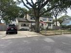 Oversized Cape home in lovely neighborhood. Perfect for oversized family. Home just needs updating. Come update this large home to your decor & taste. Full finished basement has 3 Rooms with baseboard heat that leads to beautiful 100 x100 fenced property..Large kitchen leads into a Huge Sunroom with 2 Shylights & Kidney shaped inground pool. Inground sprinklers, Front & back, Fenced, Cement Dog run. Previous owner had rental permit for huge 2 bedroom apartment upstairs. Town permit was issued & new owner to reapply. Check local zoning.. 2 Electric meters, 2 zone oil heat. Aprox 1/2 mile to LiRXR, Aprox 1 hour to Penn station. Near all town beaches, & Tanner park.