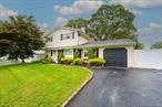 Fully Renovated Colonial in Lake Grove Estates!Step into this stunning, top-to-bottom updated home on an extra-large 1/3-acre lot. With four bedrooms, including a primary with walk-in closet, this home offers style, space, and flexibility. The bright living room features a wood-burning fireplace and sliders that lead to a resort-style backyard oasis with an in-ground pool, patio, garden, and two sets of sliders from the den and dining area, perfect for entertaining.The entry foyer welcomes you with high ceilings and a chandelier, while the eat-in kitchen boasts stainless steel appliances, hardwood and tile floors, a half bath, and laundry on the first floor. Additional updates include a five-year-old roof, a new vinyl pool liner and pool filter, a nine-zone irrigation system, gas heat, one-car garage, Belgium block driveway, and in-ground sprinklers.Enjoy privacy, room to grow, and a backyard designed for relaxation in a quiet suburban community with easy access to Smith Haven Mall, parks, restaurants, and the LIRR. Immaculate renovations, a pool, and an oversized lot make this home a true gem. Schedule your tour today!