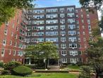 Discover a rare opportunity to own a spacious 2-bedroom, 2-bath co-op in the desirable Highlander building, ideally located in Jamaica Hills directly across from scenic Tilly Park. This sunny and freshly painted 1, 200 sq. ft. unit offers a bright and airy layout featuring a large living room, L-shaped dining area, and new ceramic tile flooring. Ample closet space.The updated kitchen includes stainless steel appliances. Both bathrooms have been renovated. One of the bedrooms is a primary suite with a full bath.  Sale includes lighting fixtures, and window treatments. Building amenities include a doorman, on-site superintendent, laundry facilities, and outdoor parking (waitlist). Conveniently located just one block from Hillside Avenue, residents enjoy easy access to shopping, public transportation, and schools.