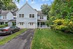 Welcome to 5 Windsor Court, Poughkeepsie, NY. Step into this beautifully crafted tri-level end-unit townhome that perfectly blends comfort, privacy, and convenience. Featuring a charming wraparound covered porch and meticulously maintained landscaping, this home is designed for both relaxation and entertaining. Inside, youâ€™ll find spacious, light-filled rooms, a family room with soaring ceilings and a cozy fireplace, and an open layout that feels both inviting and functional. The home includes central air, municipal water and sewer, and a 1-car attached garage for convenience. Upstairs, enjoy 2 generously sized bedrooms including a primary bedroom and bath, designed for comfort and functionality. As an end unit, youâ€™ll appreciate the added privacy and natural light throughout. Located just minutes from the Culinary Institute of America, Marist College, Hyde Park attractions, NYC express trains, and all Town of Poughkeepsie amenities, this home offers an unbeatable location with easy access to shopping, dining, and commuter routes. Whether youâ€™re looking for a low-maintenance primary residence or a weekend retreat, 5 Windsor Court is move-in ready and waiting for its next owner.