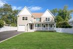 Welcome to 19 Marianna Place, a spacious and inviting 5-bedroom, 3.5-bath home nestled South of Montauk, East Islip. The large, open first floor is perfect for todayâ€™s lifestyle, offering seamless flow for entertaining featuring a beautiful wine bar. A versatile guest suite on the main level provides comfort and privacy for visitors or extended family.Upstairs, you have 4 oversized Bedrooms, a Laundry Room along with the primary suite featuring two walk-in closets and a beautifully appointed bath. Step outside to enjoy a charming front porch or relax on the expansive back deck, perfect for gatherings and summer nights.With its generous layout, vaulted ceilings, and desirable location, this home offers the perfect blend of comfort and convenience.